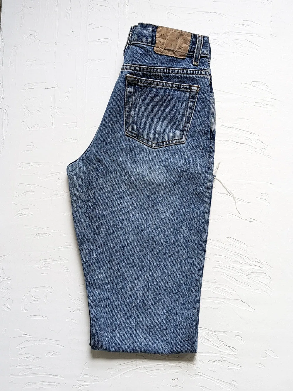 AE Medium Wash Raw Edge Kick Flare Jeans